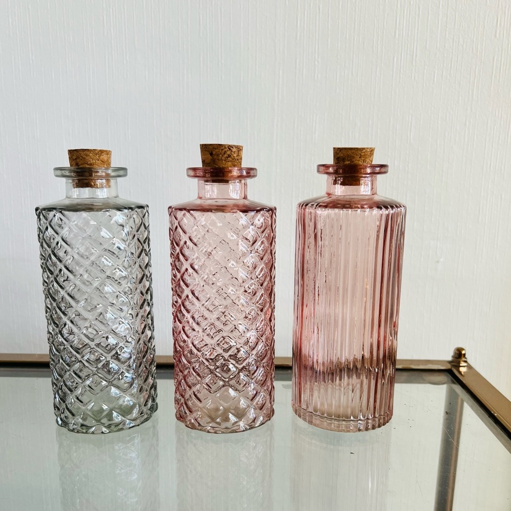 Set of Three Decorative Glass Bottles